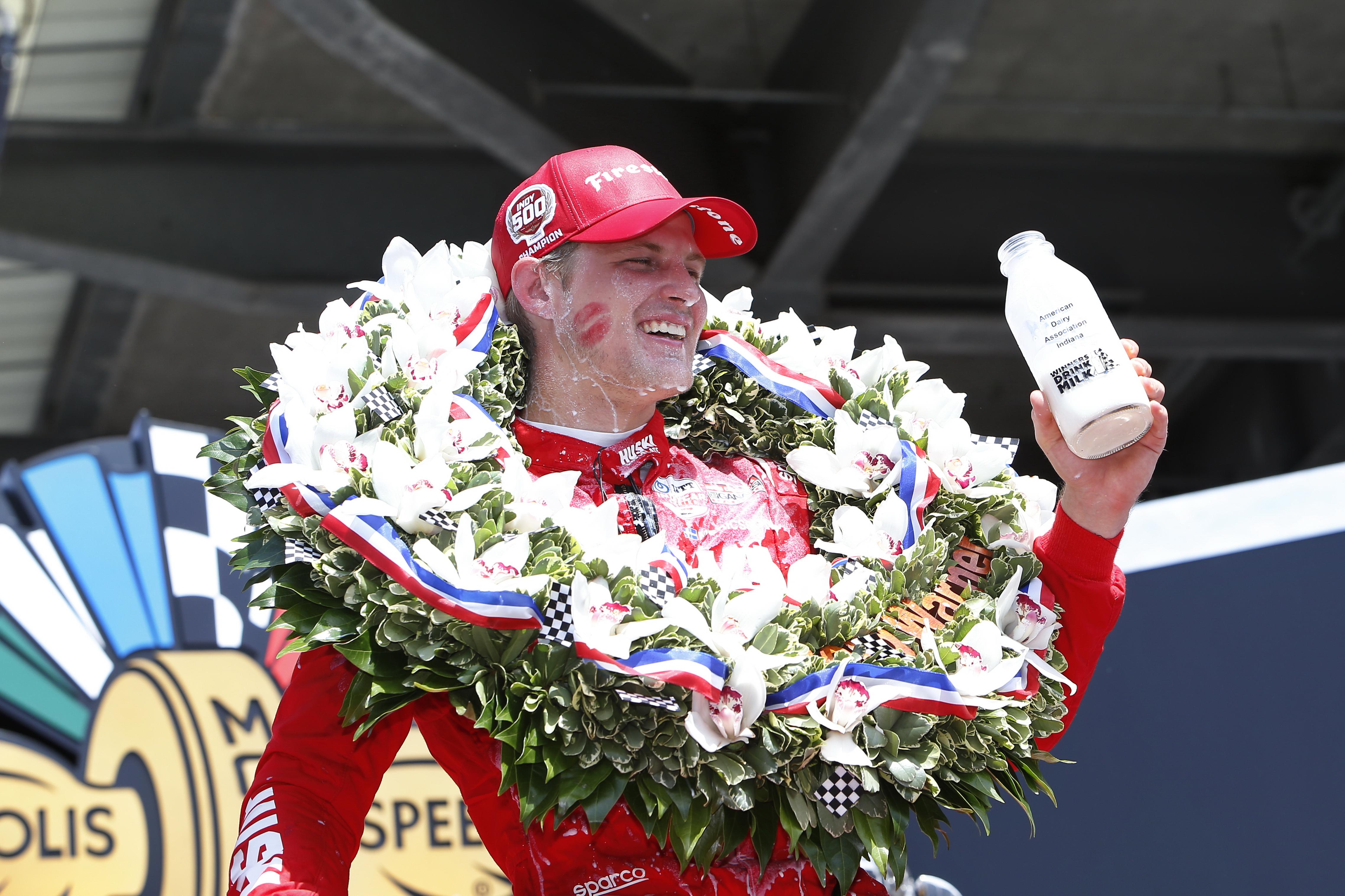 Marcus Ericsson celebrates his Indy 500 win with milk